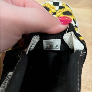 Woman’s sunflower slip on vans size 8